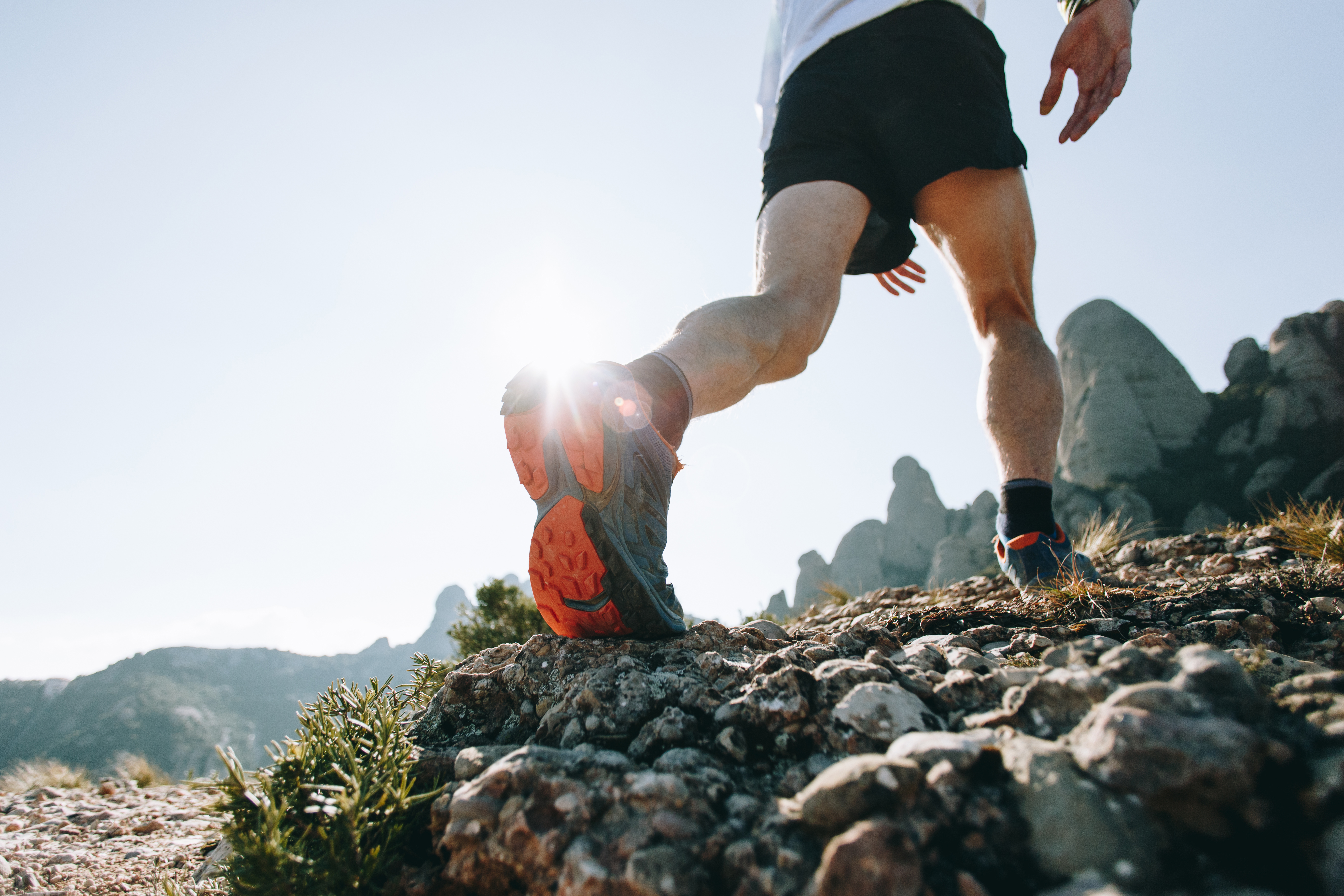 A strong man enjoying trail running